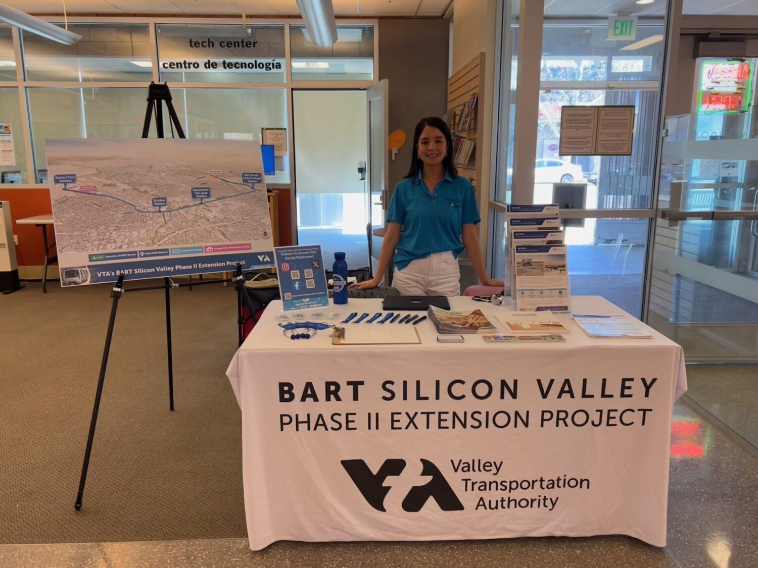 photo of booth setup inside the Biblioteca Latinoamericana Branch Library