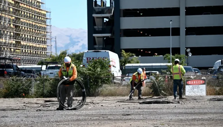 photo of Construction workers prepare the site of the Santa Clara BART station for tunnel boring.