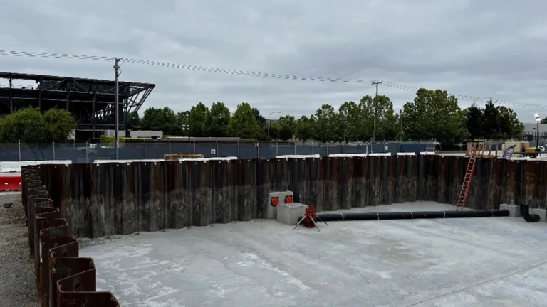 Overview of the detention basin tank used to handle storm water around the project site.